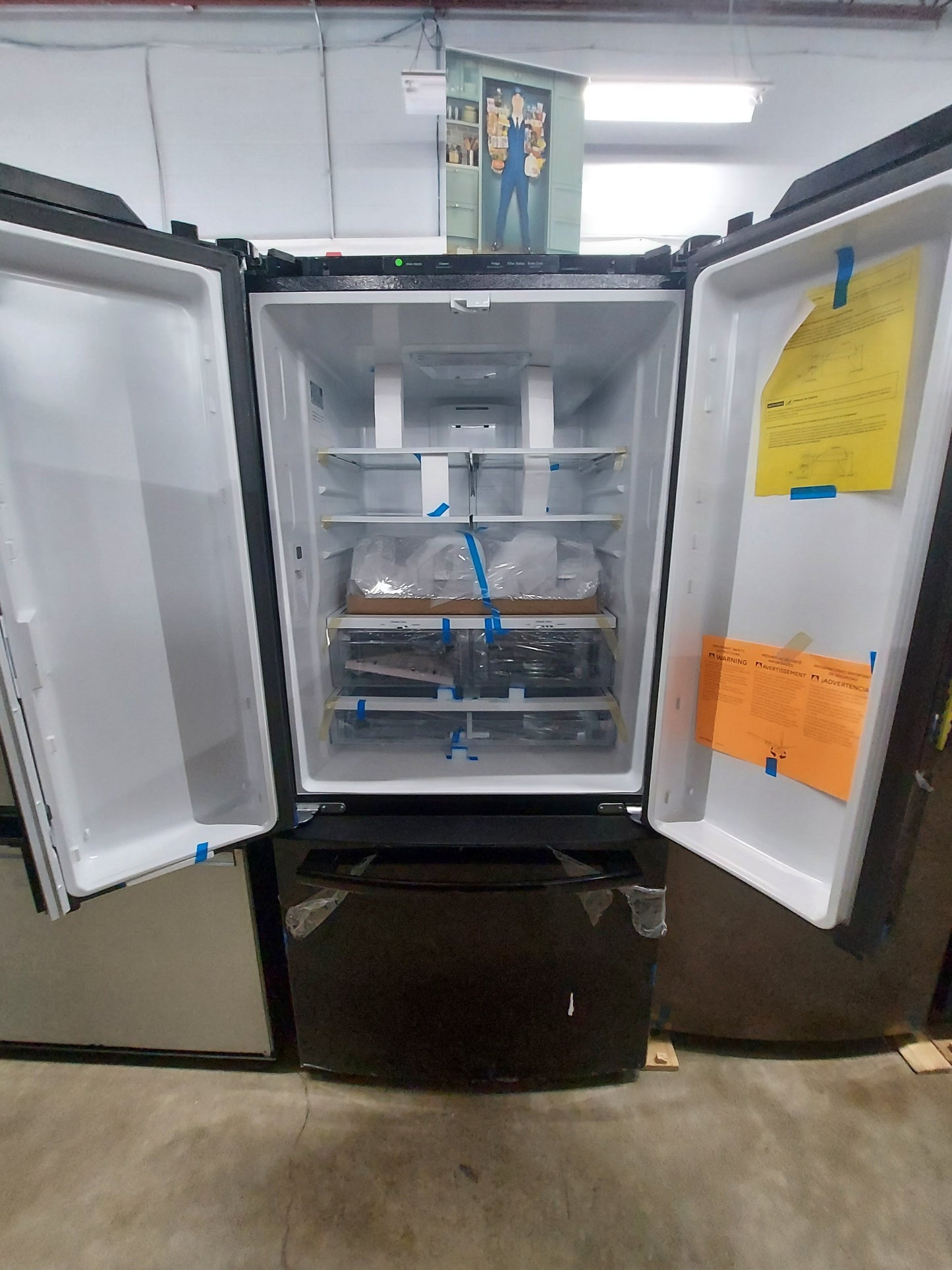 GE (GNE25JGKBB) 33 Inch French Door Refrigerator with 24.7 Cu. Ft. Capacity