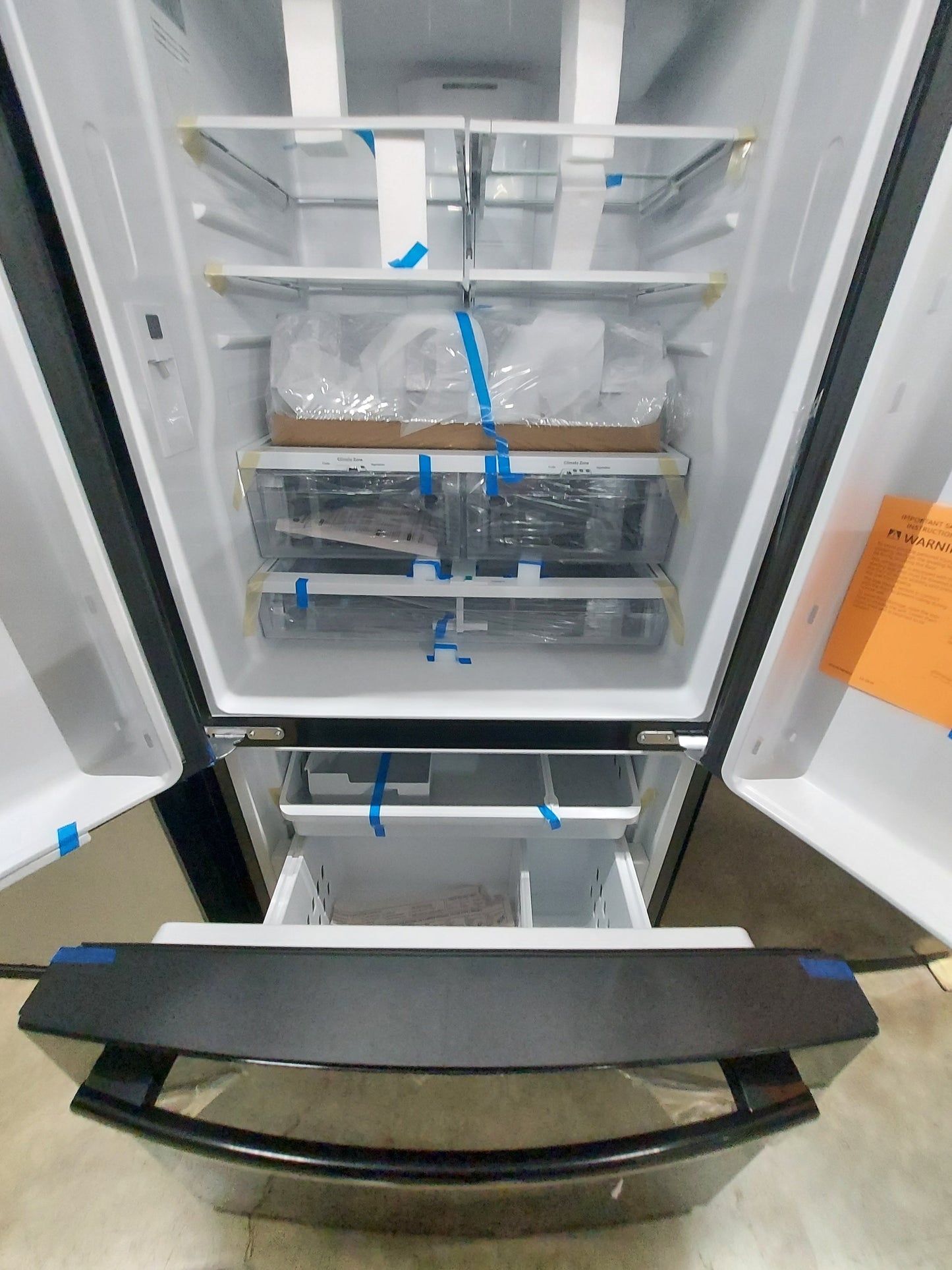 GE (GNE25JGKBB) 33 Inch French Door Refrigerator with 24.7 Cu. Ft. Capacity