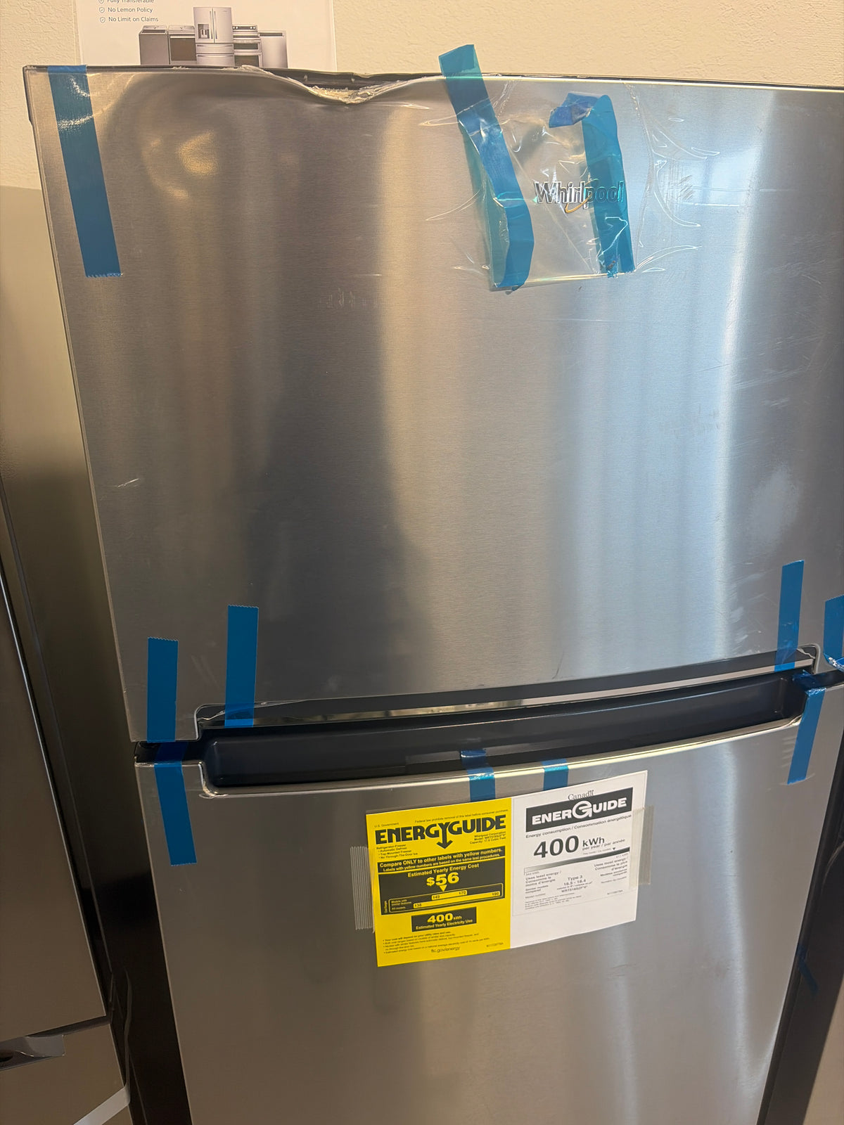 Damaged Whirlpool top mounted freezer Model #Wrt518szf